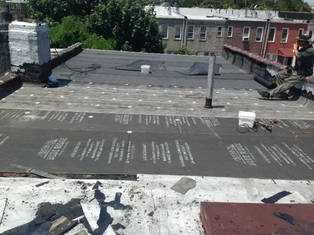 Flat Roof Contractor in NYC, Nassau & Suffolk, NY — Bellerose Roofing & Siding project